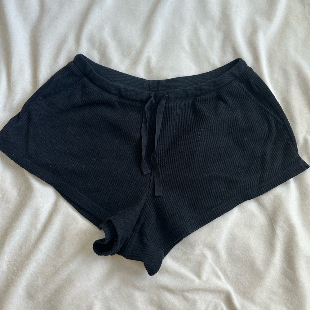 Black waffle knit pajama/lounge shorts.